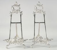 A PAIR OF SILVERED PICTURE EASELS. 21ins high.