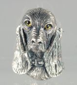 A SILVER DOG BROOCH.