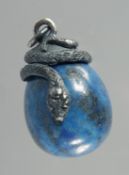 A SILVER AND LAPIS EGG PENDANT with a snake. 1in.