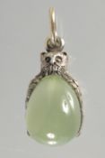 A RUSSIAN SILVER AND JADE OWL PENDANT. 1in long.