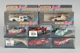 A TRAY OF EIGHT BOXED CARS.