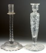 A TALL GEORGIAN GLASS CANDLESTICK with domed base. 12ins high and another hobnail cut candlestick,