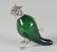 A SMALL GREEN GLASS AND PLATED COCKATOO CLARET JUG. 6ins high.