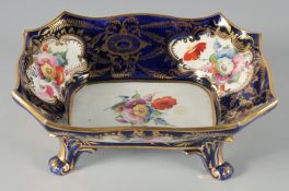 A GOOD SPODE RECTANGULAR FRUIT DISH rich blue ground painted with panels of flowers supported on