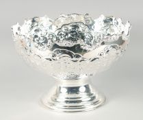 A LARGE SILVER PLATED CIRCULAR EMBOSSED PUNCH BOWL 15ins diameter, 10ins high.