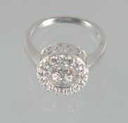 A SILVER AND C Z RING.