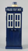 A REPLICA BLUE POLICE PUBLIC CALL BOX.