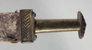 A LARGE GLADIUS SWORD WITH DOUBLE EDGED BLADE AND BRASS HILT in a red leather scabbard.