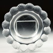 A LALIQUE CIRCULAR SHELL DISH Signed, Lalique, France. 7.5ins diameter.