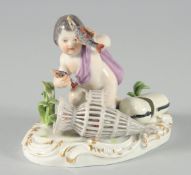 A MEISSEN PORCELAIN GROUP, young boy with a fish and a net. Cross swords mark in blue, incised
