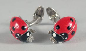 A PAIR OF SILVER AND ENAMEL LADYBIRD CUFFLINKS.