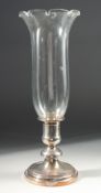 A CHRISTOFLE FRANCE STORM LAMP with glass top and circular plated base. 16ins high.