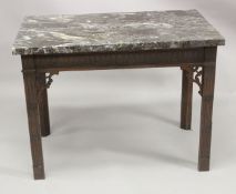 A GEORGIAN MAHOGANY SIDE TABLE with marble top, the freize and legs with a blind fret carving. 3ft