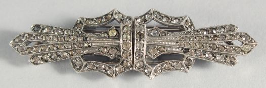 A SILVER AND MARCASITE DOUBLE BROOCH.