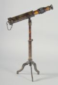 A TELESCOPE on a stand. 13ins high.