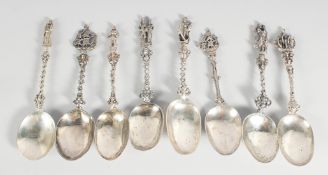A MATCHED SET OF EIGHT CONTINENTAL SILVER RAT TAIL SPOONS with figures and galleons. 7ins long.