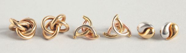 THREE PAIRS OF LION EARRINGS.