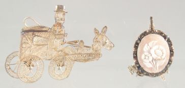 A SILVER FILIGREE BROOCH, PENDANT AND CHAIN.