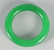 AN APPLE GREEN JADE BANGLE 3ins diameter.