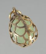 A SILVER AND JADE PIERCED PENDANT. .75in.