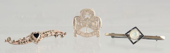 THREE SILVER BROOCHES.