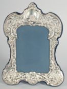 A LARGE SILVER UPRIGHT PHOTOGRAPH FRAME with crosshatch decoration. 9.5ins x 6ins