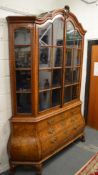 A GOOD 18TH CENTURY DUTCH MARQUETRY BOMBAY VITRINE with a pair of doors above three long drawers.