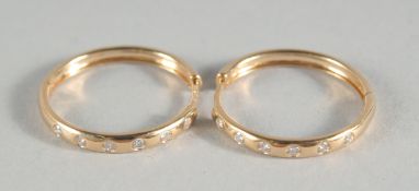 A PAIR OF 18CT GOLD AND DIAMOND HOOP EARRINGS.