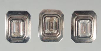 A PAIR OF SILVER C Z EARRINGS AND PENDANT