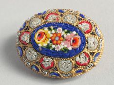 A MOSAIC OVAL BROOCH.