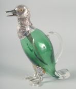 A LARGE GREEN GLASS AND SILVER PLATE DUCK CLARET JUG with glass eyes. 10.5ins.
