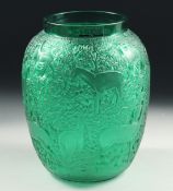 A LALIQUE GREEN VASE decorated with deer. Signed, Lalique, France. 6.5ins high.