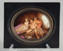 A GOOD 19TH CENTURY PORCELAIN OVAL PLAQUE painted with Bacchus. 3.25ins x 4ins framed.