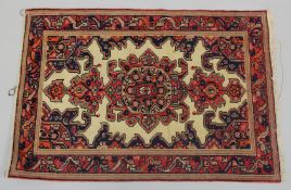 A 19TH CENTURY MALAYER RUG, 100cm x 69.5cm.