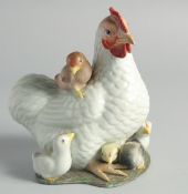 A CHINESE PORCELAIN FIGURAL GROUP, of a cockerel and chicks, character mark to base, (one chick