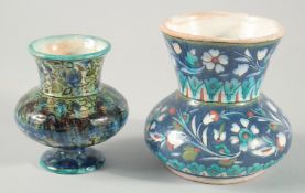 TWO IZNIK STYLE PALESTINIAN JERUSALEM VASES, 13.5cm and 11.5cm high.