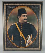 A PERSIAN QAJAR OIL ON TIN PORTRAIT PAINTING OF PRINCE MAS'UD MIRZA, YAMIN AL-DAWLA ZILL AL-