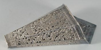 A 19TH CENTURY SOUTHEAST ASIAN, POSSIBLY THAI, SILVER BETEL LEAF HOLDER, with openwork foliate
