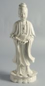 A BLANC-DE-CHINE PORCELAIN FIGURE OF GUANYIN, holding a ruyi scepter, 37cm high.