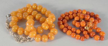 A FINE ISLAMIC - POSSIBLY OTTOMAN, STRING OF AMBER PRAYER BEADS with high carat gold tussle,