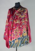 A CHINESE EMBROIDERED SILK JACKET, with embroidered dragons and phoenix.