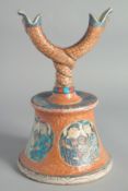AN UNUSUAL RARE CHINESE ISLAMIC POTTERY CANDLE HOLDER, painted with characters and panels of