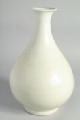 A CHINESE LIGHT-CELADON GLAZED CARVED PHOENIX YUHUCHUNPIN VASE, 32cm high.