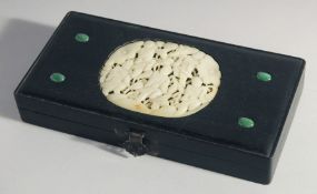 A CHINESE HARDSTONE BEADED ABACUS contained within a hardwood box - the box inset with carved jade