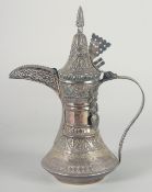 AN EARLY 20TH CENTURY SIGNED ARAB OMANI SILVER COFFEE POT DALLAH, weight 540g, 28cm high.