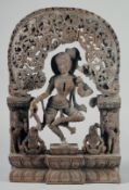 A FINE 19TH-20TH CENTURY INDIAN CARVED WOODEN GROUP, depicting a central dancing figure, 49cm x