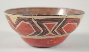 A FINE EARLY 20TH CENTURY ALGERIAN BERBER POTTERY BOWL, 11.5cm diameter.