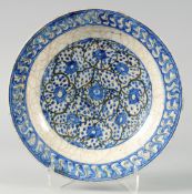 AN EARLY 17TH CENTURY SAFAVID BLUE AND WHITE 
