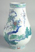 A LARGE CHINESE DOUCAI PORCELAIN VASE, decorated with prunus tree, the base with six-character mark,
