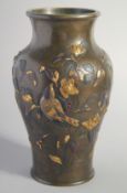 A SUPERB JAPANESE MIXED METAL OVERLAID BRONZE VASE, with gilded decoration depicting a bird